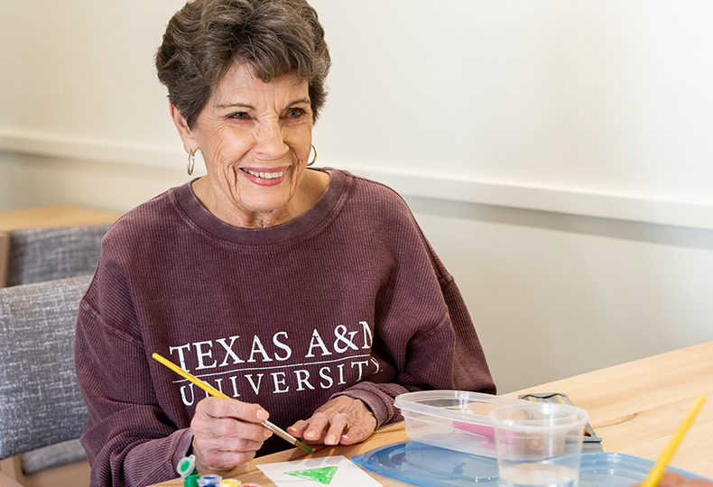 FWB-art-class-790x540 Resident creating a watercolor painting
