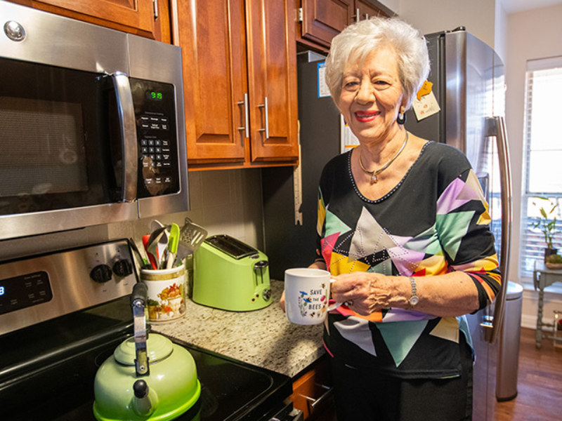 FWB-res-640x600 Woman in her kitchen at Broadway Cityview