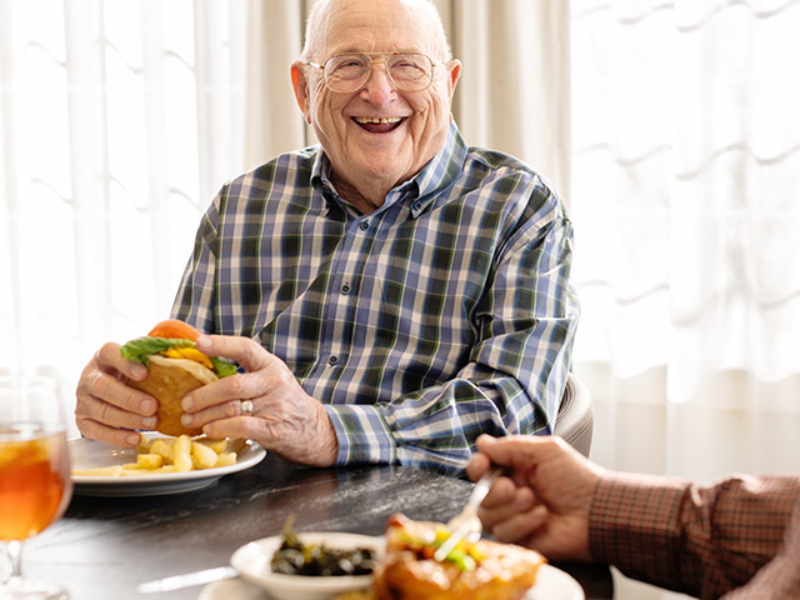 dining-640x600 Smiling man.