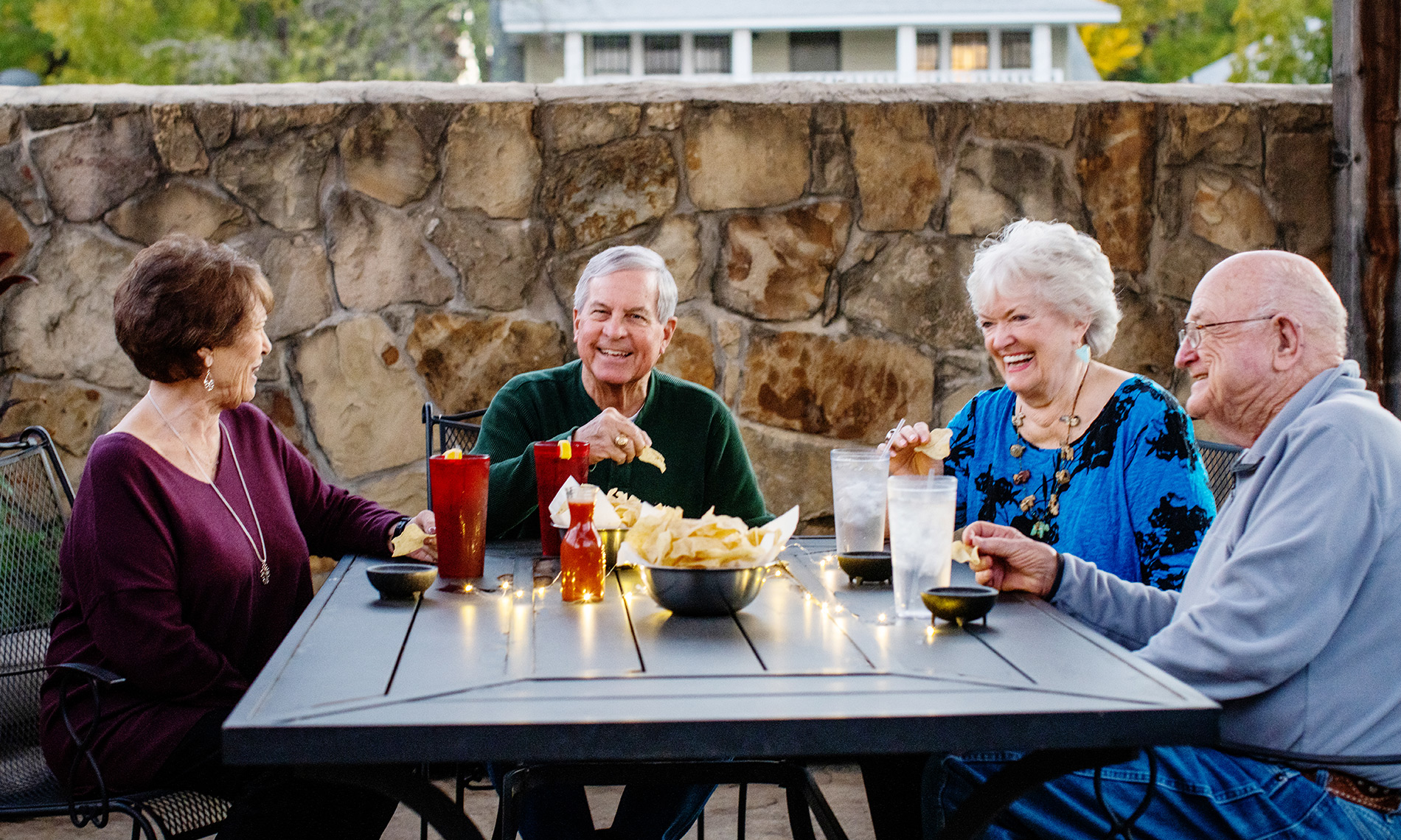 Residents of Broadway Cityview dining outdoors