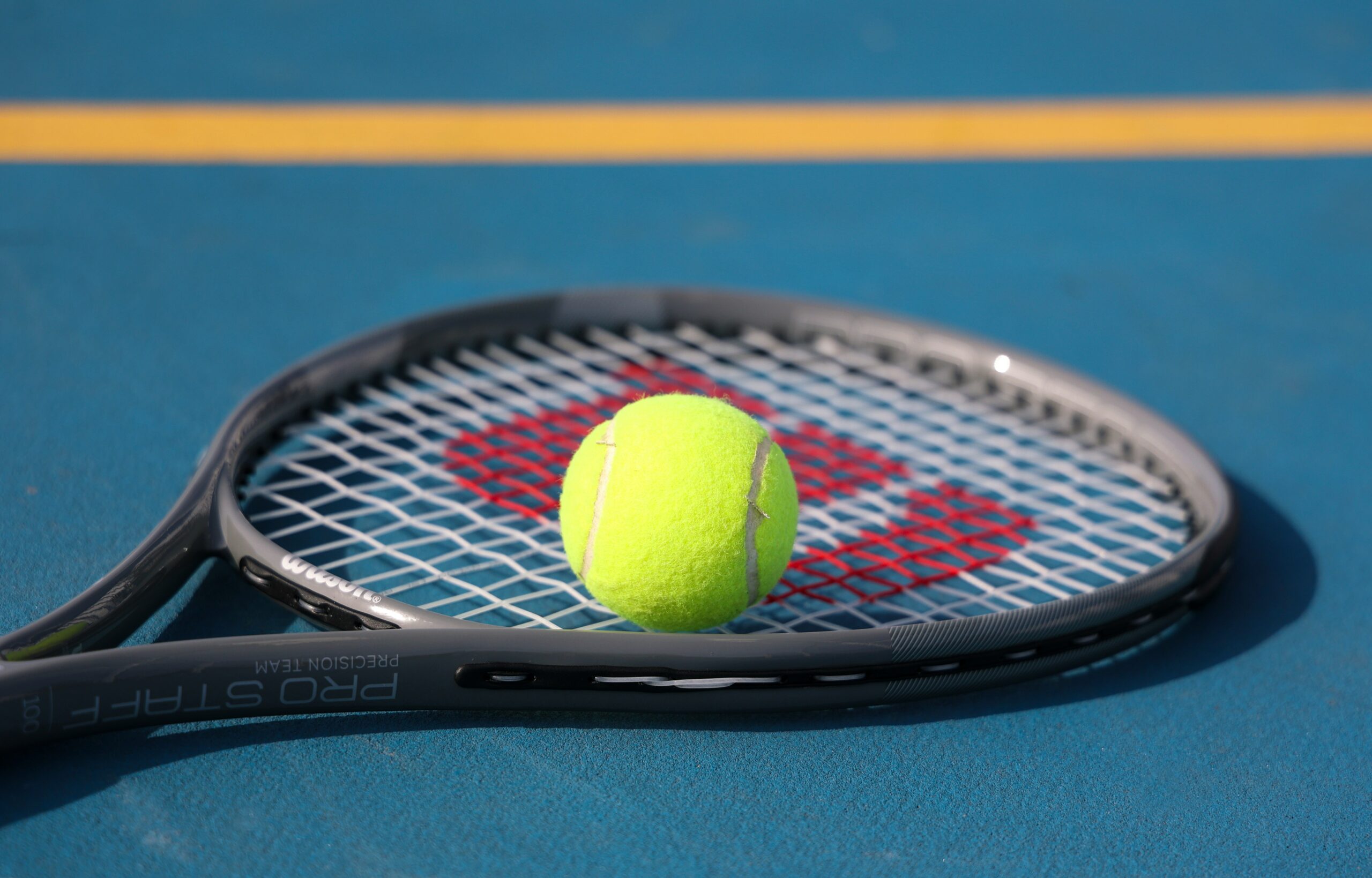 tennis racket + tennis ball