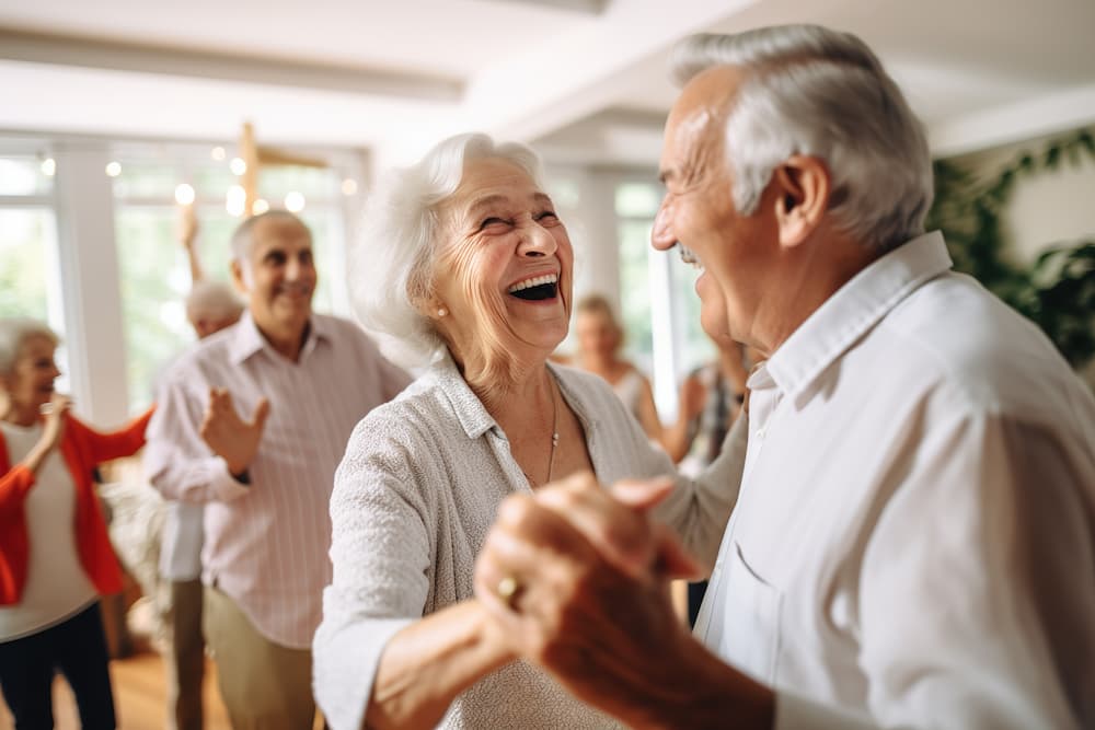 Senior couple dancing at event